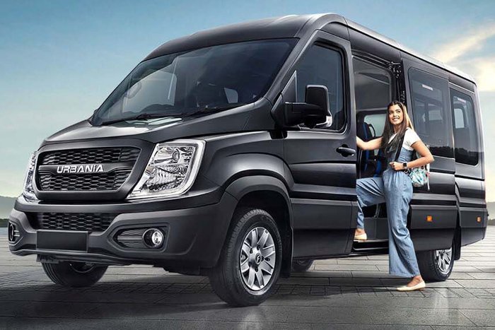 12 seater Force Urbania traveller on rent in Delhi with luxury seating and spacious interior